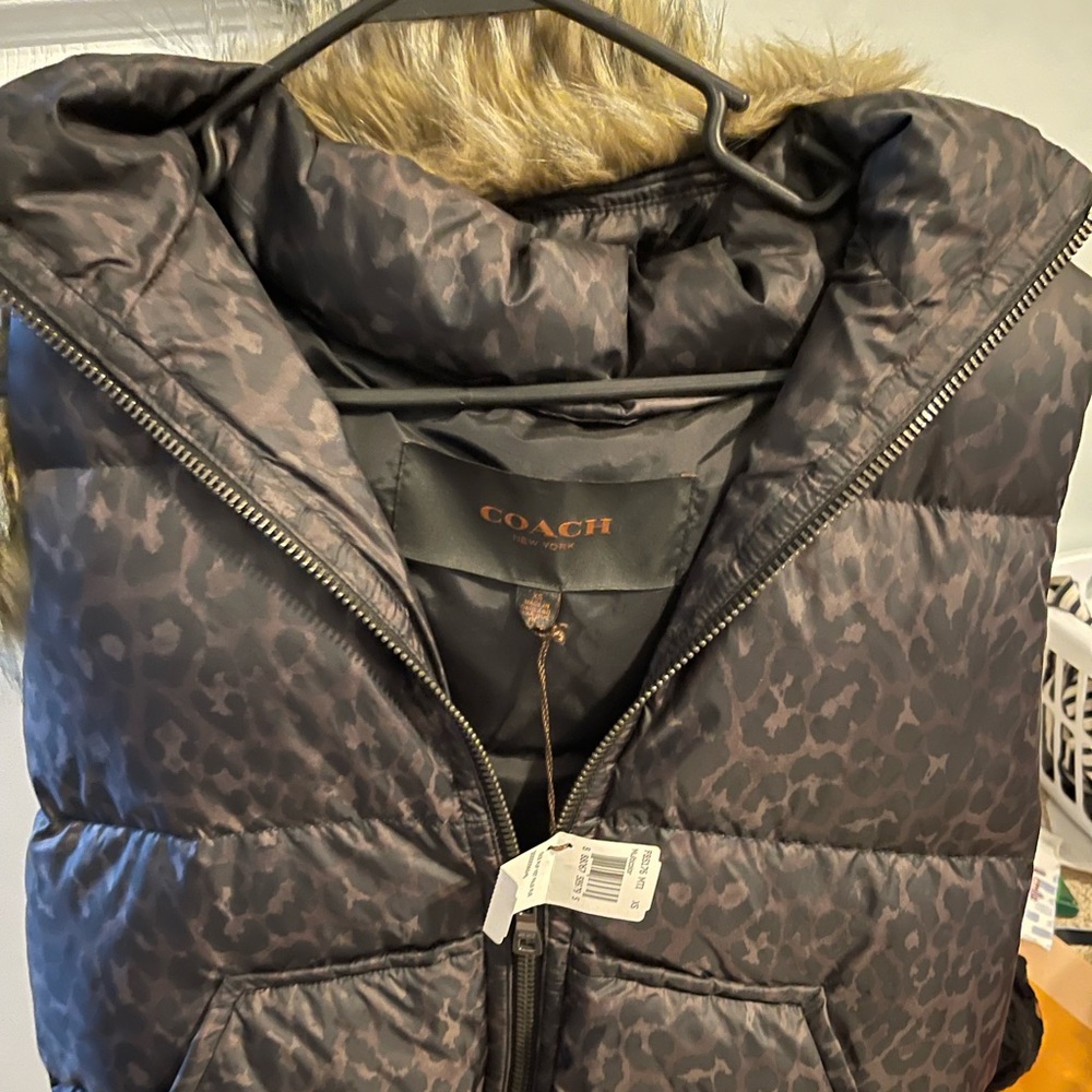 It’s brand new, never been worn. Says it’s and XS but fits like a Small